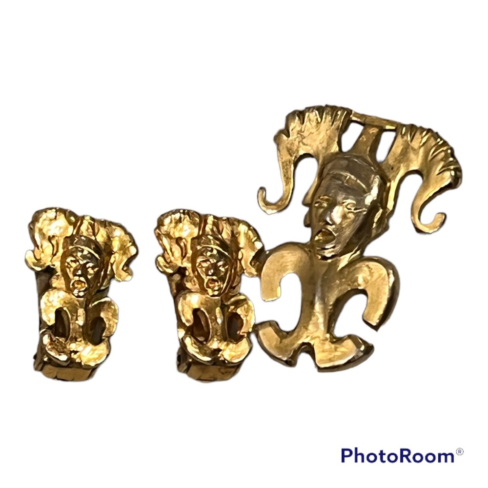Vintage gold tone metal brooch and earrings